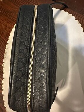 Gucci Black Embossed Leather Crossbody Bag with Gold Zipper